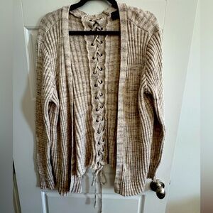 Cozy sweater with lace up detail